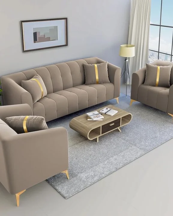 Taupe sofa set with a three-seater, two armchairs and a centre table.