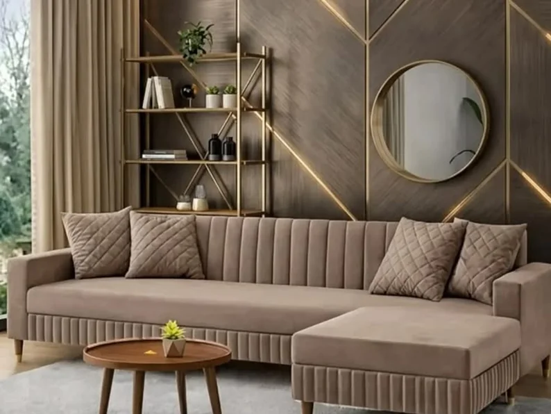 Taupe channel-back L-shape sofa with an ottoman.